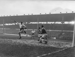 George McLeod attempts some nifty foot work but without success