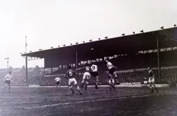 Allan Brown and Derek Saunders compete for a header