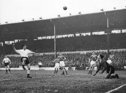 Gordon Turner`s header sails over the bar
