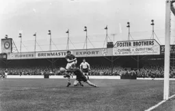 Joe Walton and Fred Else collide. The ball ran loose to George Cummins who scored the first goal