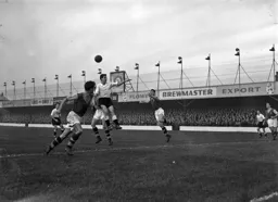 Allan Brown jumps but cannot make contact with the ball
