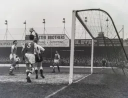 Tony Gregory looks on as Arsenal keeper Jack Kelsey catches the ball