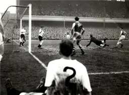 Jimmy Bloomfield scores the only goal of the game for Arsenal