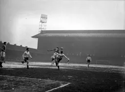 City`s Willie Cunningham heads the ball clear from Tony Gregory