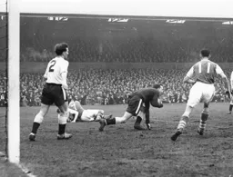 Ron Baynham gathers the ball as Town repell an Ipswich attack