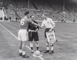 Skipper Syd Owen shakes hands with his Forest counterpart Jack Burkitt
