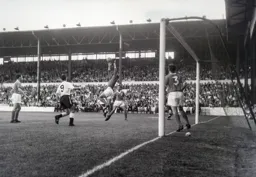 Blackpool's George Farm safely holds on to the ball