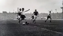 Gordon Turner hammers the ball goalwards