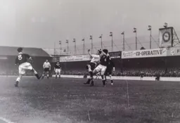 Dave Pacey tries to get a shot away