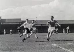 Joe McBride looks to shoot past future Hatter Ron Cope