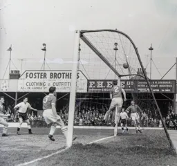 Gordon Turner watches the ball drift over the bar