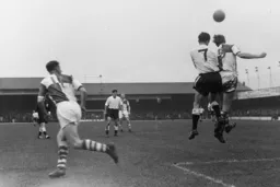 Mike Tracey goes up for the ball