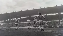 Alec Ashworth watches as the ball is cleared