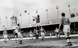 The Derby goalkeeper clears