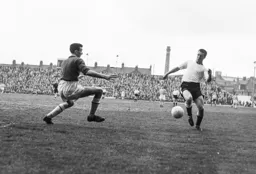 Alec Ashworth tries to push the ball past the Brighton goalkeeper (1)