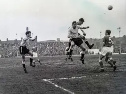 Bob Morton attacks the ball