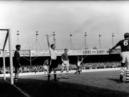 Alec Ashworth signals a goal