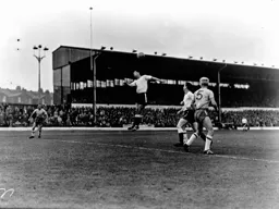 Bob Morton gets his head to the ball