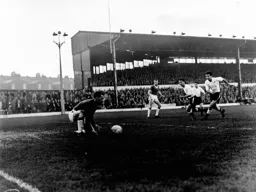 McKechnie and Ashworth chase down the goalkeeper