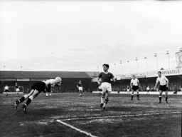Robin Chandler tries to get his head on the ball