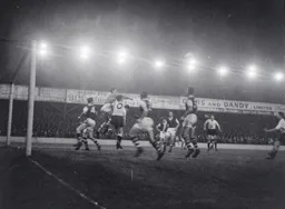 Ipswich keeper Roy Bailey punches the ball clear