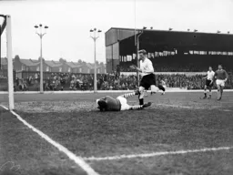 Mark Lownds, on his debut, goes in on the goalkeeper
