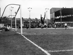 Swans keeper Noel Dwyer is beaten by this long range effort from Dave Pacey