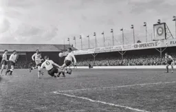 Terry Kelly and Dave Pacey block the ball