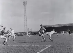 Bob Morton stretches for the ball