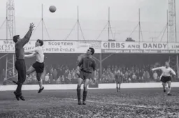 John O'Rourke about to clatter the goalkeeper