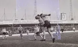 Harry Walden gets his head to the ball