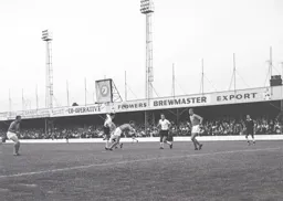 Gordon Riddick gets the better of Duncan Forbes to send a header towards goal