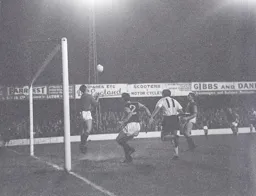 Villa keeper Geoff Sidebottom moves to catch the ball as Ray Whittaker closes in