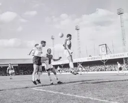 David Pleat heads the ball into the six yard area