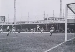 Jack Connor heads the ball clear for City