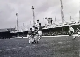 Gordon Riddick rises highest to send a header towards the goal