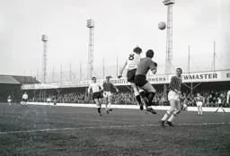 Billy Harber challenges United keeper Ian McKechnie to this high ball
