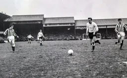 Tommy McKechnie brings the ball into the penalty area