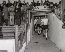 John Reid leads the team out followed by Colin Tinsley Tony Read and Robert Thomson