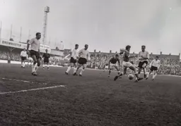 Robert Thomson plays the ball through Dennis Fidler`s legs to a waiting Matt Woods