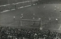 Torquay goalkeeper Gary McGuire goes down to save