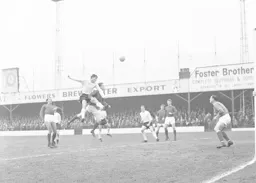 A leaping John O`Rourke heads the towards the goal
