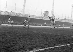 John Reid heads the ball down in the direction of a waiting John O`Rourke