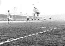 John O`Rourke gets in front of Duncan Forbes to win a header