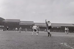 Richard Edwards heads the ball backwards to Tommy McKechnie