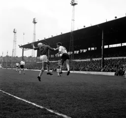 John O'Rourke heads the ball infield