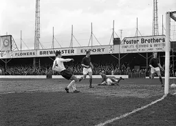 Gordon Riddick opens the scoring with future Town manager Ray Harford unable to prevent it
