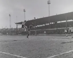 Keith Allen sends a header towards goal