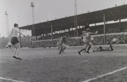 The keeper is down on the ground but Keith Allen cannot apply a finishing touch