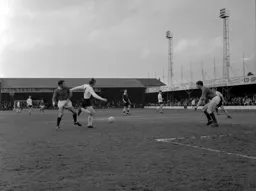 Keith Allen tries to get a shot away